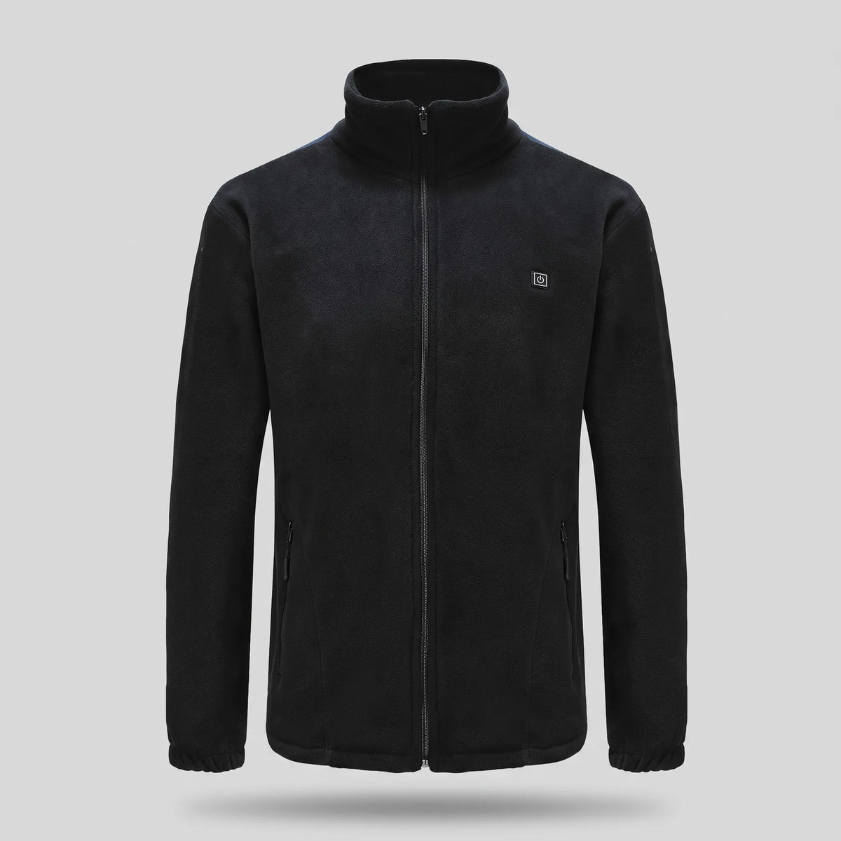 Polaire chauffante noire seule sur fond gris