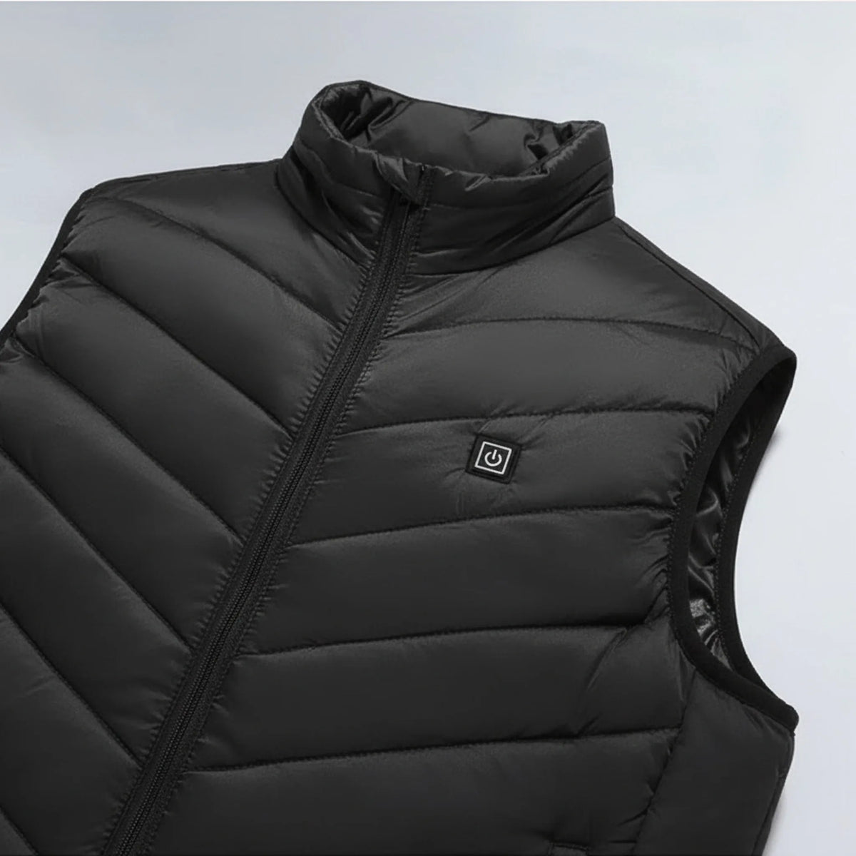 Bouton de chauffe du gilet chauffant Chaudia
